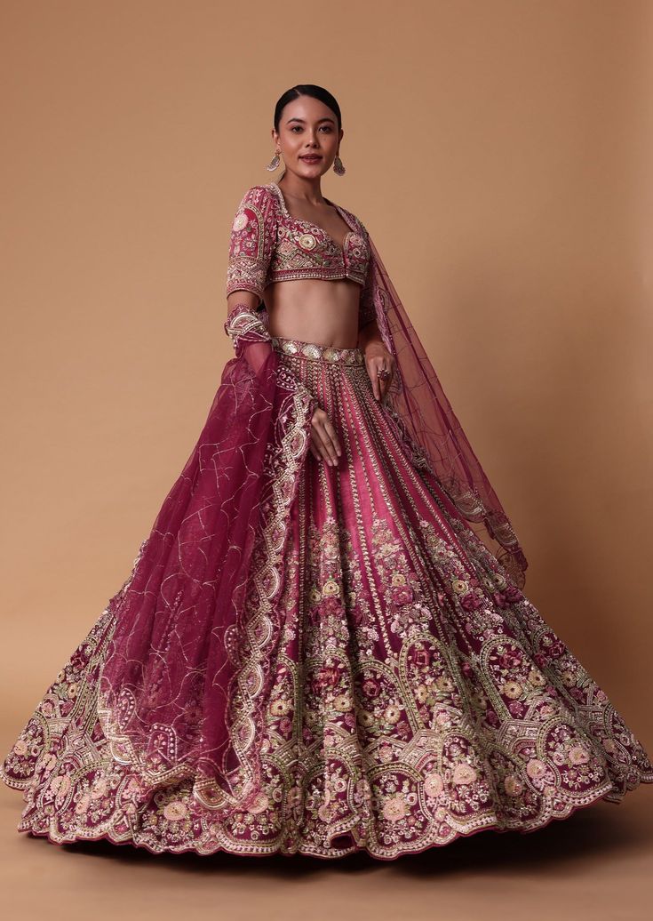 Introducing our exquisite red velvet raw silk lehenga set that will help you exude elegance and charm on your D day. Featuring a choli cut blouse in a soft coral hue that is enhanced with stunning zardosi work. Crafted with meticulous attention to detail this set of four ensemble that is complemented with two whimsical dupattas will accentuate your curves with grace and sophistication. Dry clean only if required. Slight variation in color is possible due to digital photography. Choli Cut Blouse, Trending Lehenga Designs, Crystal Blouse, Latest Bridal Lehenga Designs, Chic Prom Dresses, Bridal Lehenga Designs, Latest Bridal Lehenga, Raw Silk Lehenga, Zardosi Work