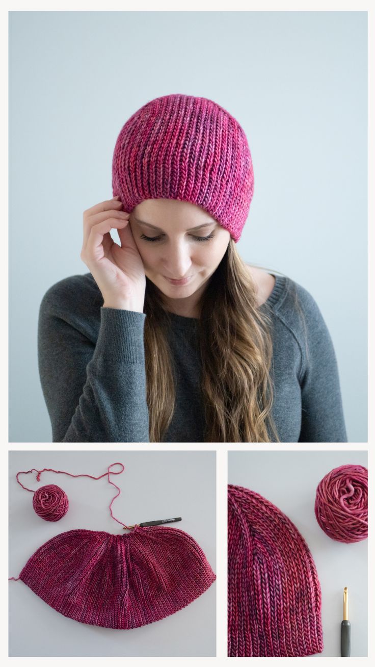 a woman wearing a pink knitted hat and holding her hand to her ear while knitting