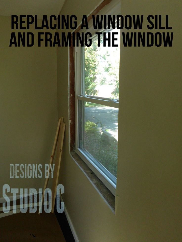 a window with the words replacing a window sill and framing the window above it