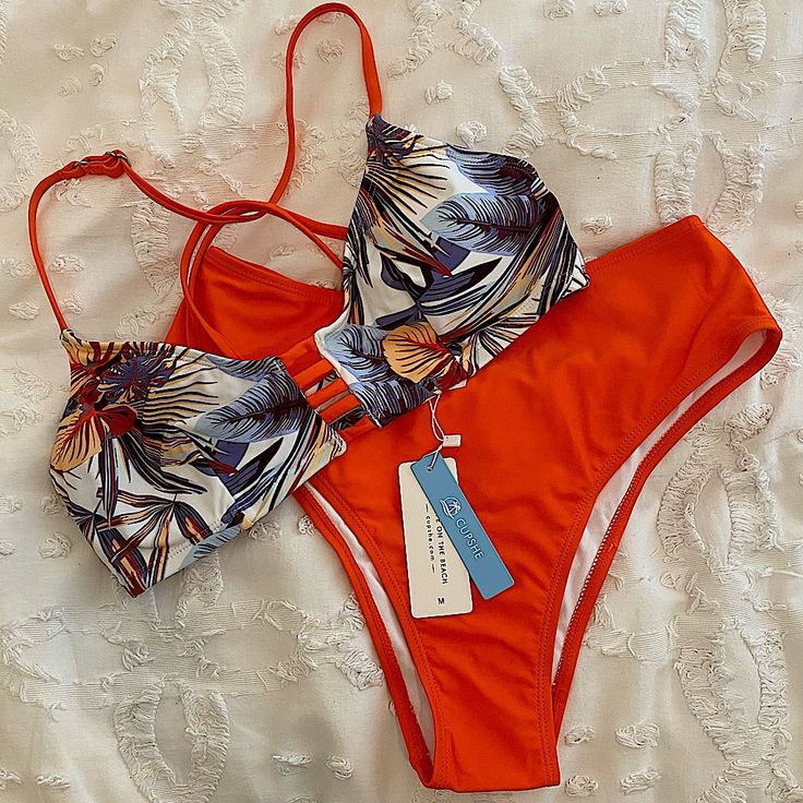 Cupshe Tropical Print Bikini. Cutout Strappy Top With An Adjustable Strap And A High Waisted Orange Bottom. Brand New With Tags And Bag! Tropical Strappy Swimwear For The Beach, Tropical Strappy Swimwear For Beach Season, Tropical Strappy Swimwear For Poolside, Tropical Strappy Swimwear For Sunbathing, Strappy Swimwear For Beach Party Season, Beachy Strappy Swimwear For Vacation, Orange Tropical Print Swimwear For Beach Season, Underwire Swimwear With Tropical Print For Beach Season, Tropical Underwire Tankini For Beach Season