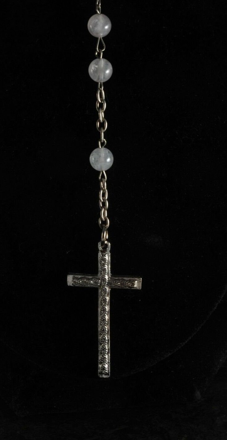 "For sale is a vintage rosary beaded cross necklace. This necklace is silver tone metal with hematite and faux pearl. The cross measures 3/4 x 1 1/2\". The rosary chain measures 26\" with a 4\" drop. New Treasures added all the time. Check back often!" Bead Cross Necklace, Beaded Cross Necklace, Straw Placemats, Bead Cross, Vintage Rosary, Festival Necklace, Metal Fish, The Rosary, Beaded Cross