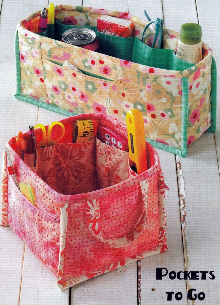 two storage bags sitting on top of a white wooden floor with the words pockets to go written above them