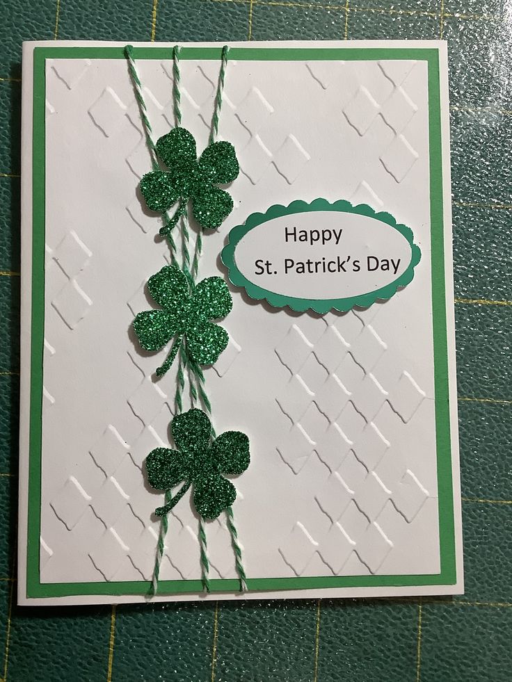 a st patrick's day card with shamrocks on it