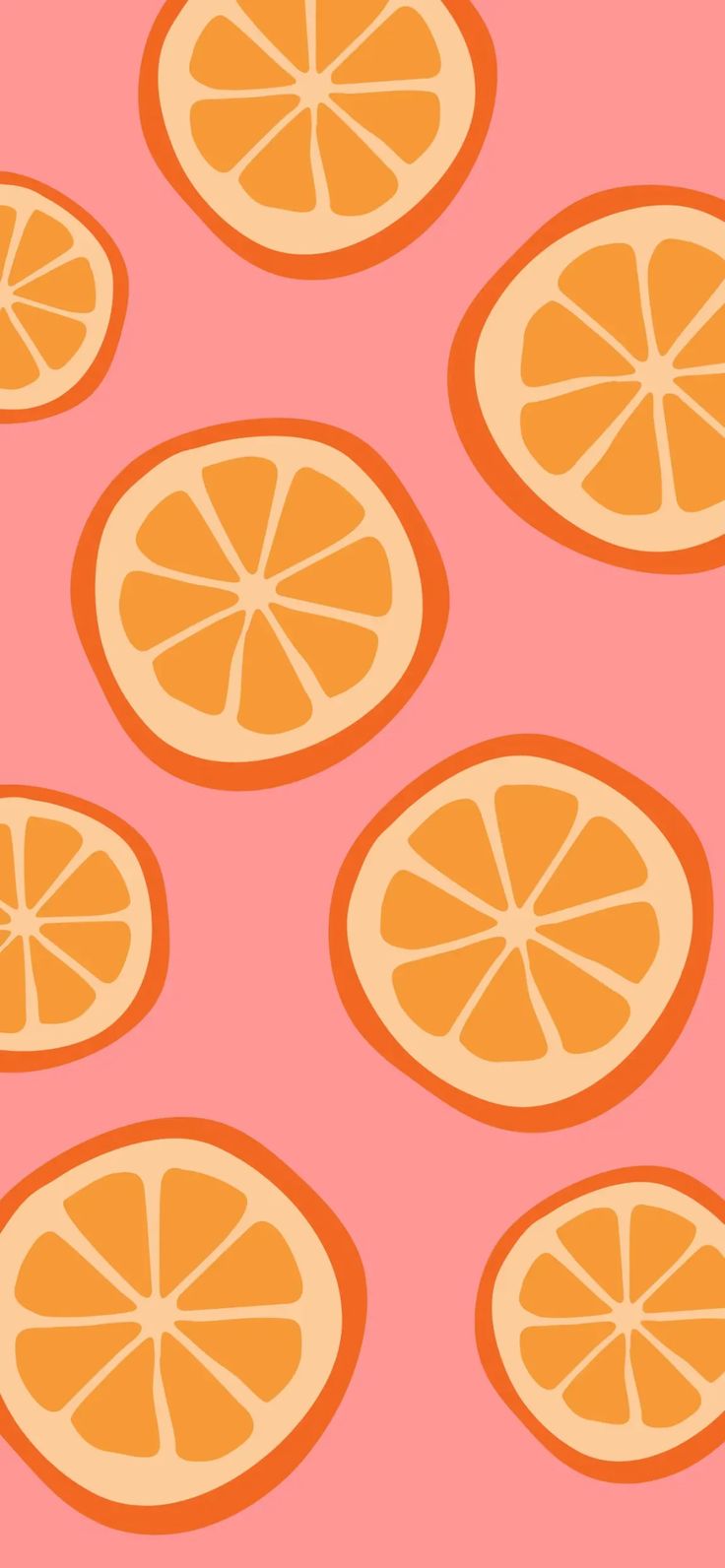 orange slices are arranged on a pink background