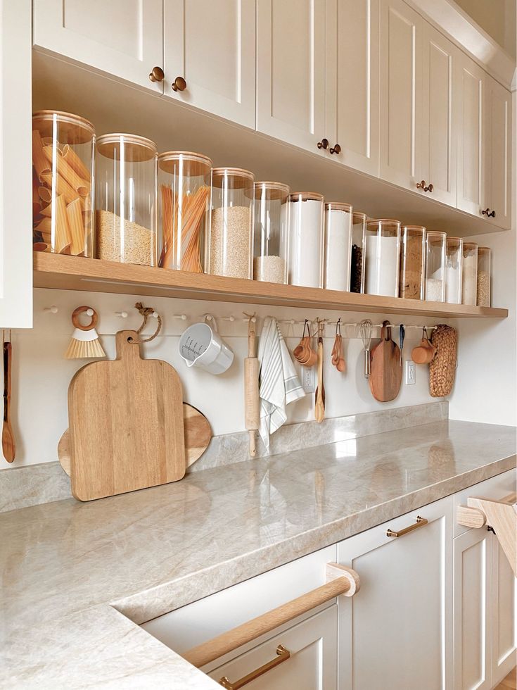 the kitchen counter is clean and ready to be used as a cook's pantry