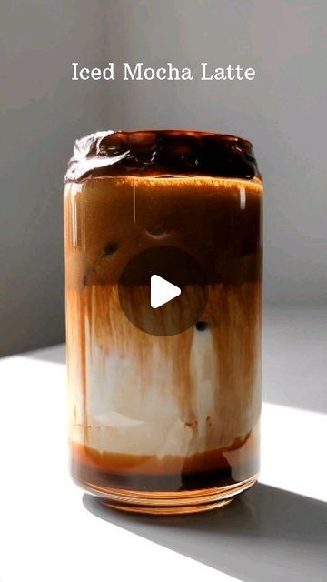 an iced mocha latte in a jar with the words iced mocha latte