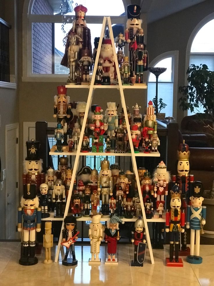 a christmas tree made out of nutcrackers and figurines