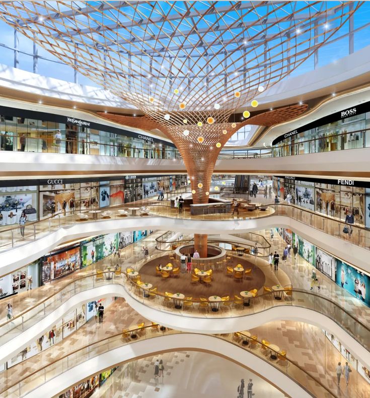 the inside of a shopping mall filled with lots of people