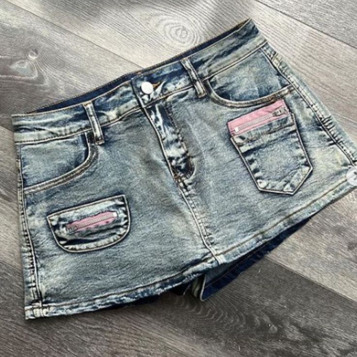 We Call This Skort Angel. This Denim Skort Is A Stonewash Denim Skort Featuring A Pink Zipper For Accent. This Mini Jean Skort Is Perfect For The Summertime Barbeques, A Casual Day Out With Your Friends Or Dress Is Up With A Corset And Metallic Boots For A Baddie Concert Outfit Idea. This Item Does Run Small So We Suggest To Size Up. Tags Denim Jean Cotton Corduroy Skirt From Fitting Bodycon Bandage Zipper Closure Summer Nightclub Form Classy Luxe Two Piece Outfit Skirt Set Skort Set Mini Skirt Acid Wash Denim Mid-rise Bottoms, Y2k Washed Denim Blue Bottoms, Y2k Denim Blue Washed Bottoms, Acid Wash Mid-rise Denim Bottoms, Pink Y2k Style Denim Jeans, Mid-rise Acid Wash Bottoms With Pockets, Pink Mid-rise Denim Bottoms, Pink Washed Denim Bottoms, Acid Wash Short Bottoms With Pockets