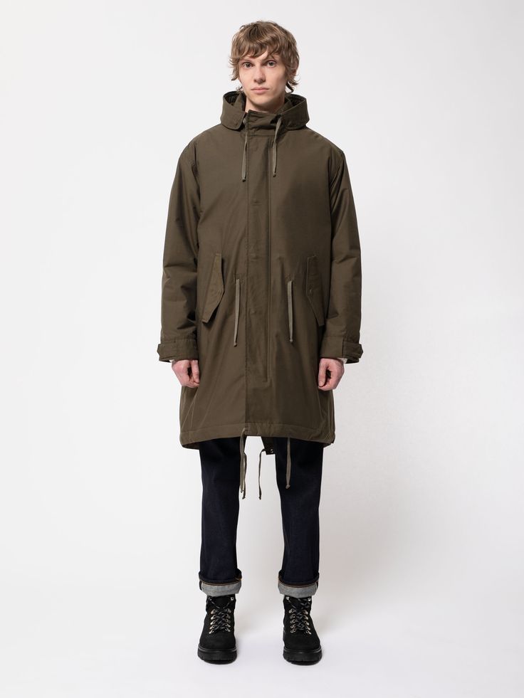 Kajjan Waxed Parka Olive - Nudie Jeans Urban Outerwear With Adjustable Hood, Urban Outerwear With Adjustable Hood For Everyday, Casual Cotton Raincoat For Rainy Weather, Hooded Cotton Raincoat For Rainy Weather, Urban Khaki Cotton Parka, Cotton Raincoat With Pockets For Rainy Weather, Functional Khaki Parka With Double-lined Hood, Urban Khaki Parka With Double-lined Hood, Urban Style Waterproof Parka For Fall