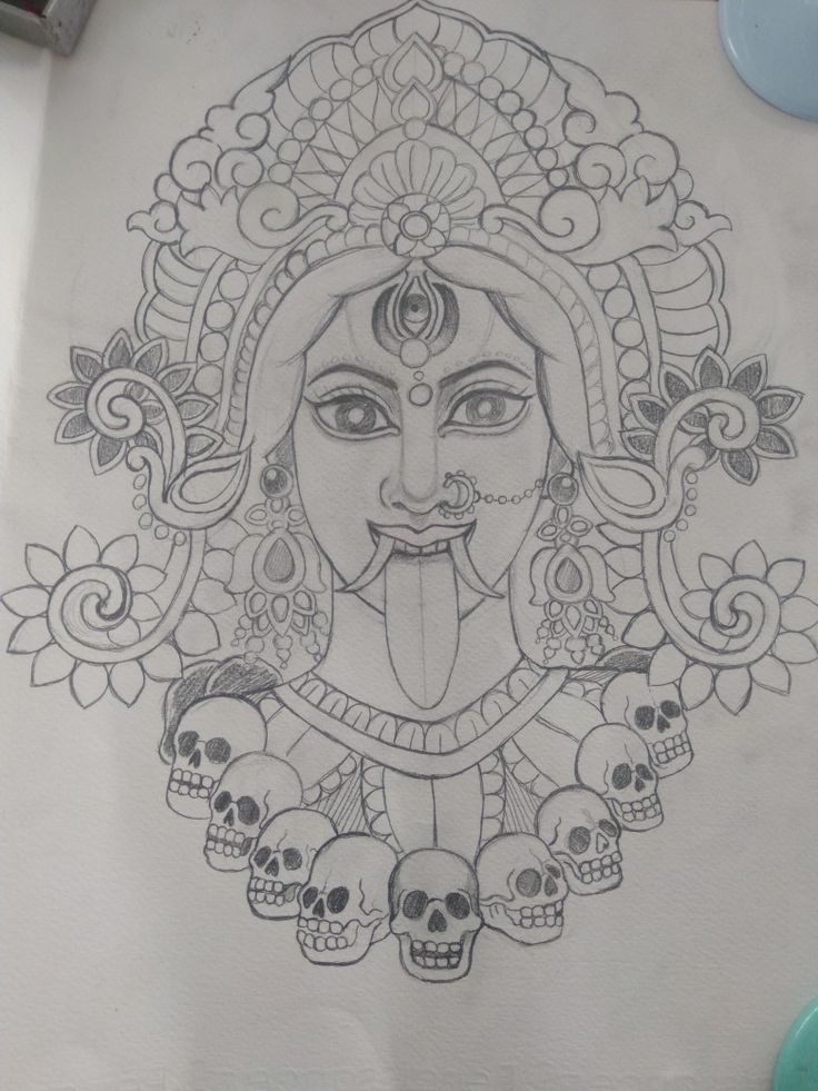 a drawing of a woman's face with skulls on it