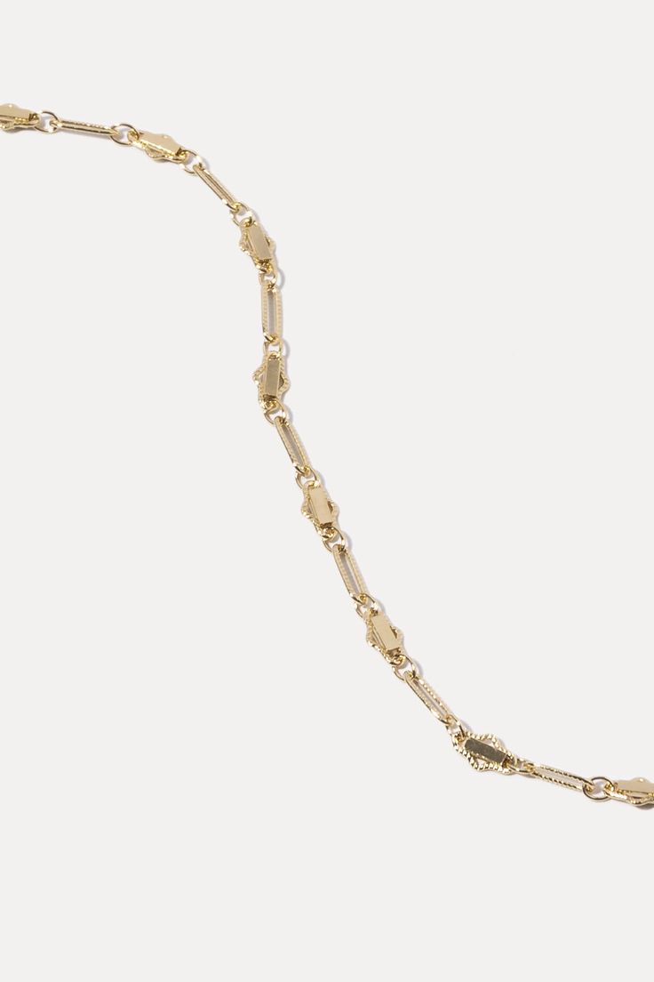 Life is too short to wear boring jewelry. With Harlow, you get the classic feel of a chain necklace, with a modern twist in design. Intricate detailing gives this piece a fresh, luxe feel for everything from cocktail parties to jeans and tees. Add your favorite charm to complete your look. Gold-filled or sterling silver 3mm chain width Available in 3 lengths Elegant Brass Necklace With Figaro Chain, Luxury Brass Delicate Chain Necklace, Delicate 14k Gold-filled Tarnish-resistant Chain Necklace, Elegant Tarnish-resistant Brass Chain Necklace, Luxury Gold-tone Tarnish-resistant Chain Necklace, Harlow Necklace, Life Is Short, Cocktail Party, Gold Filled