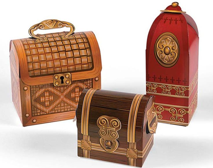 three wooden boxes with decorative designs on the top and bottom, one has a lock