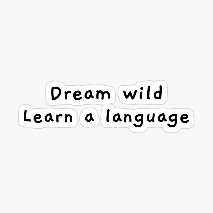 the words dream wild learn a language sticker