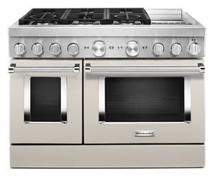 a double oven stove with two burners on the front and one in the back