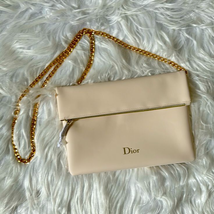 New Dior Beaut Pouch/Clutch Ivory/Gold Brand New, Never Used Ivory With Gold Zipper Chain Is Not Included Designer Beige Evening Bag With Detachable Strap, Designer Beige Crossbody Clutch, Luxury Beige Crossbody Clutch, Designer Beige Clutch With Detachable Strap, Designer Cream Shoulder Bag For Evening, Luxury Beige Clutch With Detachable Strap, Classic Cream Evening Clutch, Beige Pouch Evening Bag With Gold-tone Hardware, Designer Beige Clutch With Gold-tone Hardware