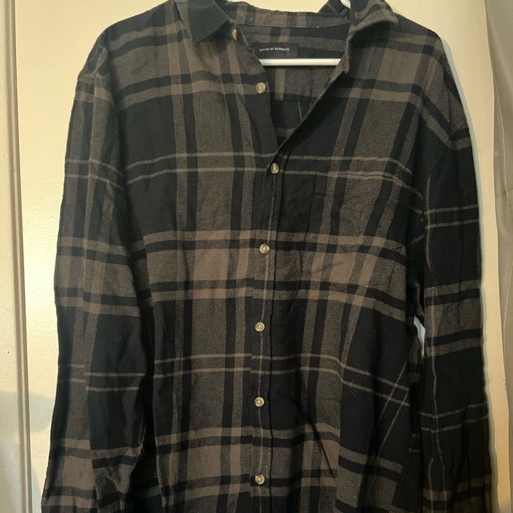 Brown And Black Flannel Never Worn No Tears No Stains All Buttons Intact Black Long Sleeve Flannel Shirt For Fall, Black Relaxed Fit Button-up Flannel Shirt, Classic Black Flannel Top, Black Long Sleeve Flannel Shirt With Button Closure, Classic Black Flannel Shirt For Fall, Black Winter Flannel Shirt With Button Closure, Casual Black Flannel Shirt For Winter, Black Button-up Casual Flannel Shirt, Casual Black Flannel Shirt For Fall