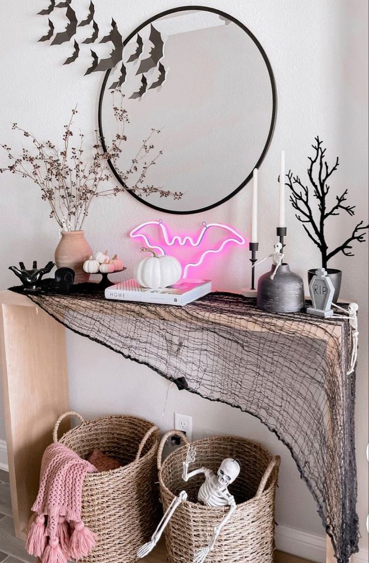 some baskets are sitting on a table near a mirror