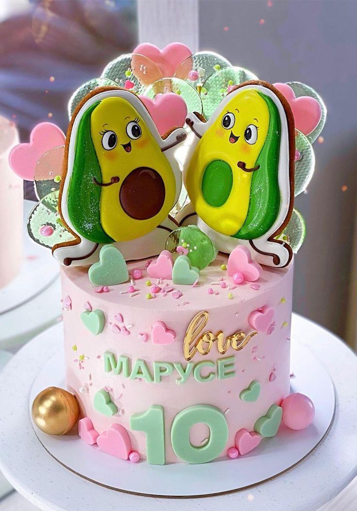 there is a cake decorated to look like two peas on top of each other with the words love