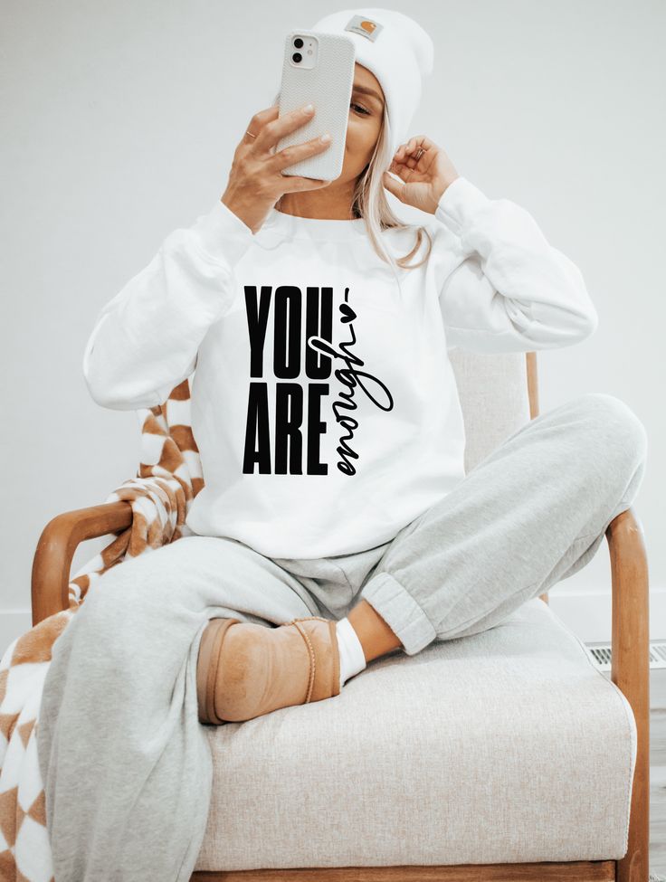 Our designs are pressed onto soft, unisex fitting apparel. Quotes On T-shirts, Ideas For T Shirts Print, Shirt With Sayings, Print On Demand Shirts, You Are Enough Sweatshirt, Creative Shirt Design Ideas, Back Print T Shirt Design, Popular Tshirt Designs Shirt Ideas, You Are Enough Shirt