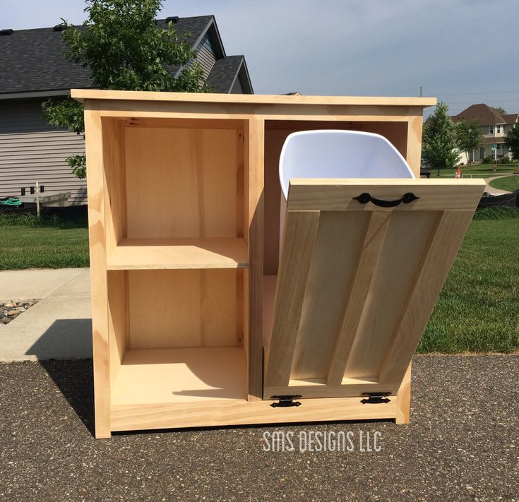 Trash Can Storage Kitchen Diy Plans, Diy Kitchen Trash Can Cabinet, Trash Can Storage Kitchen Small Spaces, Wood Trash Can Holder, Wooden Trash Can Holder, Tilt Out Trash Can Cabinet, Tilt Out Trash Can, Wooden Trash Can, Hide Trash Cans