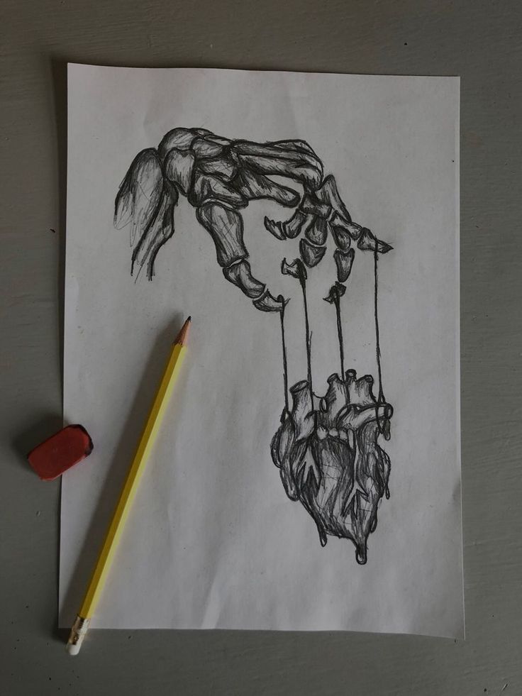 a pencil drawing of two hands hanging from strings with one hand holding the other's head