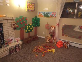 a room with toys and decorations on the floor