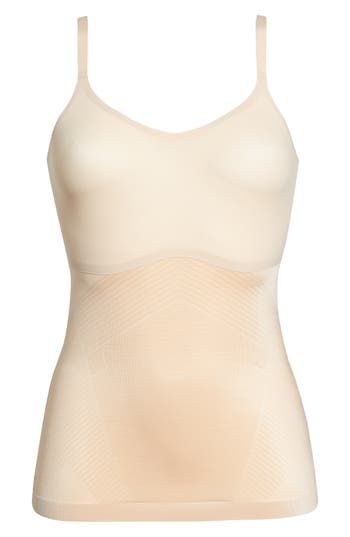 Create a smooth look under everyday outfits with this lightweight, breathable shaping cami that wraps around your body and targets your tummy and sides. The stretchy, single-layer fabric smoothes out any lumps or bumps, and the noncompression bust offers a squish-free fit. Scoop neck Adjustable straps 77% nylon, 23% elastane body; 55% nylon, 45% Lycra® elastane bust Machine wash, tumble dry Imported Supportive Shapewear Tank Top With Built-in Bra, Solid Full Coverage Shapewear Tank Top, Sleeveless Seamless Shapewear, Sleeveless Shapewear With Seamless Construction, Seamless Sleeveless Shapewear, Supportive Seamless Sleeveless Camisole, Seamless Shaping Sleeveless Shapewear, Shaping Seamless Camisole, Summer Shaping Shapewear With Seamless Construction