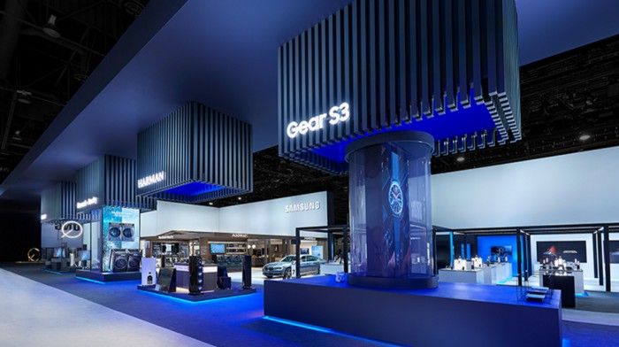 the interior of a car showroom with blue lighting