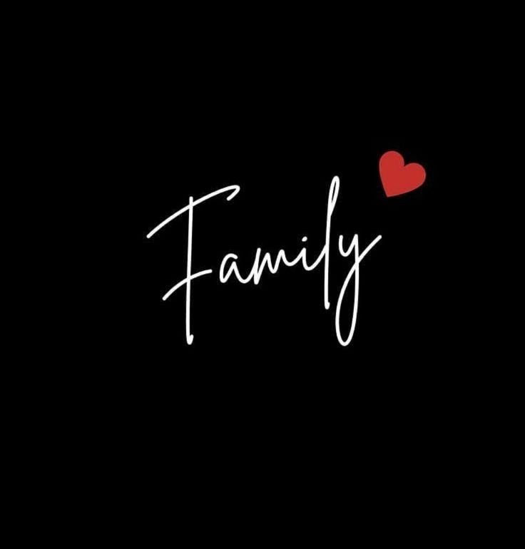 the word family written in white ink on a black background with a red heart above it