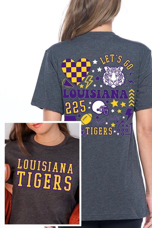 LSU TIGERS,FOOTBALL UNISEX SHORT SLEEVE,GRAPHIC TEE,GRAPHIC TSHIRTS,TSHIRTS,TEES100%COTTON,HEATHER(52%COTTON,48%POLY),ATH.HEATHER,BLACK HEATHER(90%COTTON,10%POLY)NICARAGUAMade In: NicaraguaSize Measurement (inch): S: 36.0 (Bust), 18.0 (Waist), 18.0 (Hips), 28.0 (Length) M: 40.0 (Bust), 20.0 (Waist), 20.0 (Hips), 29.0 (Length) L: 44.0 (Bust), 22.0 (Waist), 22.0 (Hips), 30.0 (Length) XL: 48.0 (Bust), 24.0 (Waist), 24.0 (Hips), 31.0 (Length) Purple College T-shirt With Team Name, Sporty Shirt For College Sports Season, School Spirit Sports Shirt With Crew Neck, Team-colored Sporty Shirt With Graphic Print, Sporty College Shirt With Team Name, Sporty Team-colored Shirt With Graphic Print, Sporty Pre-shrunk Team-colored Shirt, Varsity Tops With Sublimation Print For Sports Events, Collegiate Short Sleeve Shirt With Graphic Print