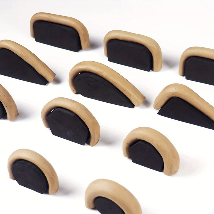 twelve pieces of black and brown wooden ear tips