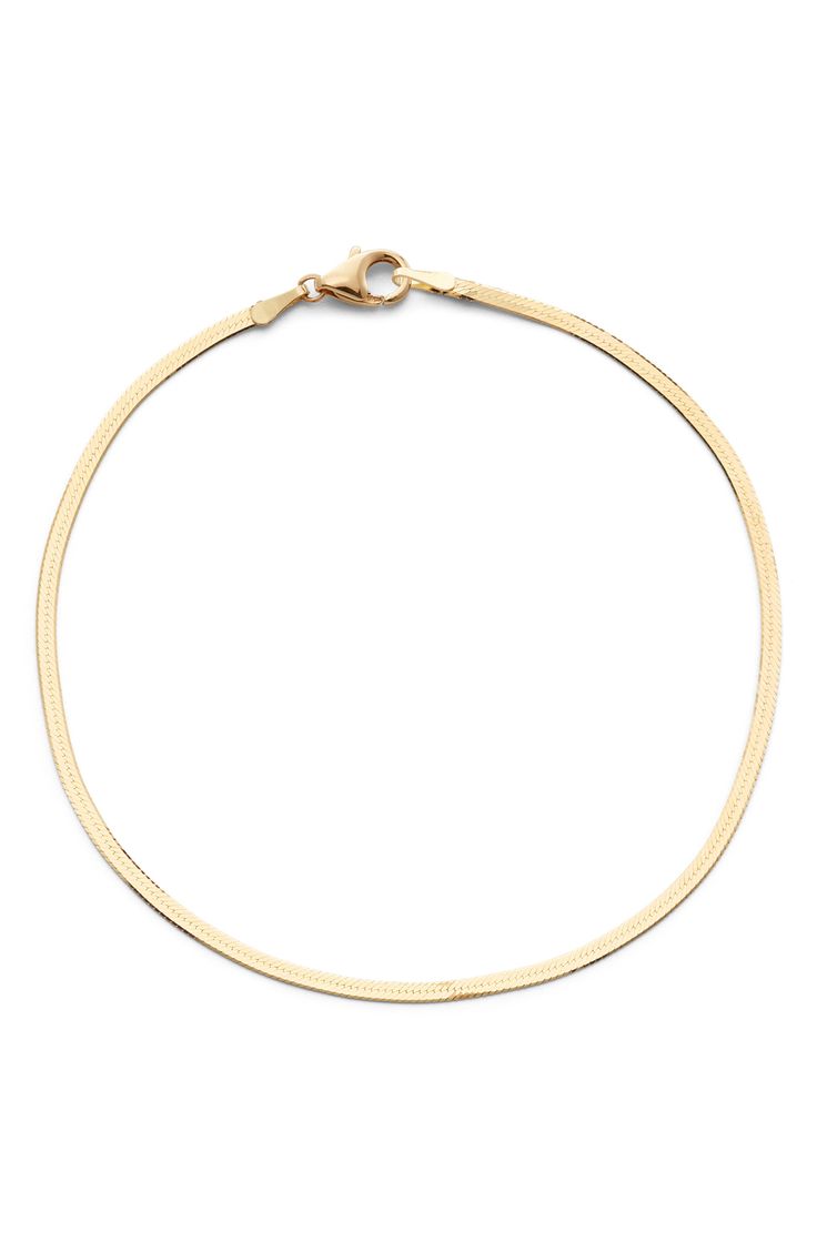 This slinky snake chain in high-polish 14-karat gold makes a delicate, layer-friendly bracelet. Style Name:Lana Jewelry Liquid Gold Chain Bracelet. Style Number: 6020338. Available in stores. Minimalist Snake Chain Bracelet With Lobster Clasp, Modern Gold Snake Chain Bracelet, Modern Yellow Gold Snake Chain Bracelet, Tarnish Resistant Snake Chain Bracelet, Modern Gold Bracelet In Snake Chain Style, Formal Snake Chain Bracelet, Gold Flexible Snake Chain Bracelet, Classic Flexible Snake Chain Jewelry, Gold Snake Chain Bracelet With Adjustable Chain