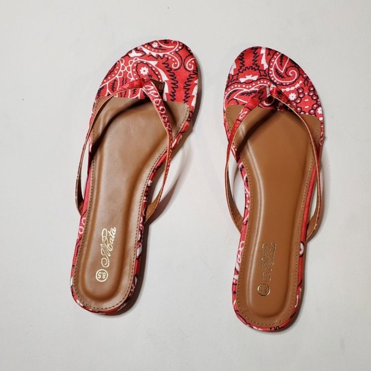 Brand New Red Trendy Open Toe Flip Flops, Trendy Red Open Toe Flip Flops, Trendy Red Flat Flip Flops, Red Open Toe Casual Flip Flops, Casual Red Open Toe Flip Flops, Red Flip Flops For Summer Vacation, Red Flip Flops For Spring Vacation, Red Round Toe Flip Flops For Beach Season, Red Round Toe Sandals For Beach Season