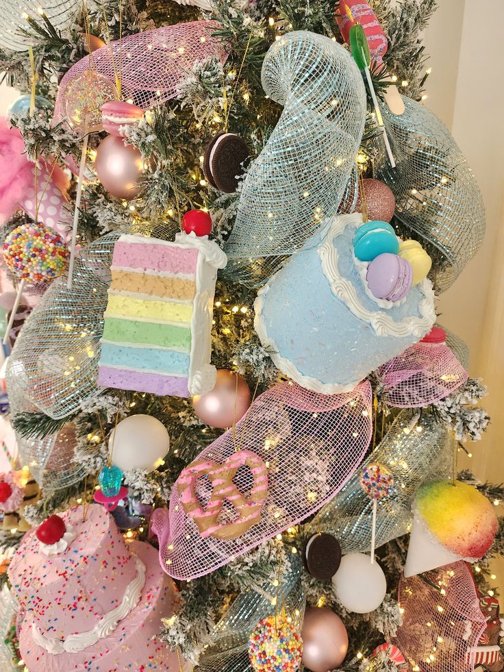 a decorated christmas tree with lots of colorful decorations