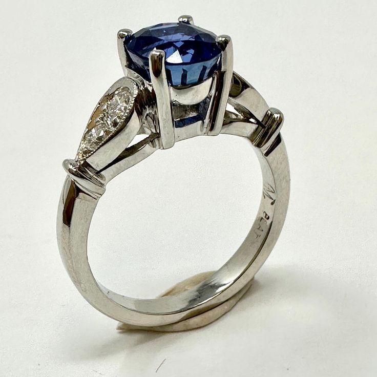 Platinum Ring with Sapphire and Diamond (includes appraisal, Value: $8,000) Designer = Jewelry Size = 5 Material = Platinum Gemstone = Sapphire/Diamond Condition = Very Good Class = Premier Location: Wilmette Item Number: 14175-270 Item ID: 285856 Category: Ring Oval Platinum Gemstone With Center Stone, Gia Certified Oval Sapphire Ring In Platinum, Gia Certified Platinum Gemstones Fine Jewelry, Luxury Wedding Ring With Accent Stones, Exquisite Multi-stone Diamond Ring In Platinum, Exquisite Multi-stone Platinum Diamond Ring, Luxury Round Gemstones With Diamond Accents, Luxury Sapphire Ring With Round Cut, Luxury Round Cut Gemstones With Center Stone