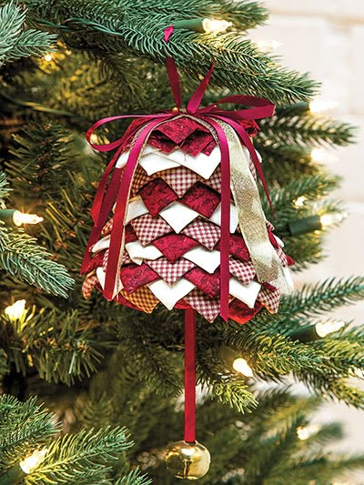 an ornament hanging from a christmas tree with the words, quick no sew ornaments