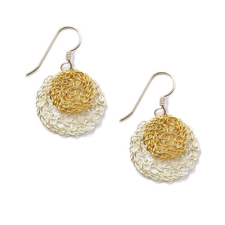 These handcrafted, handwoven earrings feature a layered sterling silver and 14kgf (gold-filled) circle. They're light and easy to wear for casual everyday, as well as for special occasions such as weddings, date nights, and holidays. MetaLace Jewelry is inspired by the beauty of nature. Each piece is individually handcrafted, one at a time, from silver wire. Found in art galleries and museum shops, each piece of MetaLace jewelry is an original work of studio art. American Made. Original Design by the artist, Kathryn Scimone Stanko. Handmade Spiral Yellow Gold Earrings, Elegant Handwoven Silver Jewelry, Elegant Handwoven Earrings, Gold Wire Wrapped Round Earrings, Artisan Handwoven Silver Jewelry, Artisan Gold Handwoven Earrings, Gold Handwoven Earrings As Gift, Gold Handwoven Earrings For Gift, Silver Handwoven Dangle Jewelry