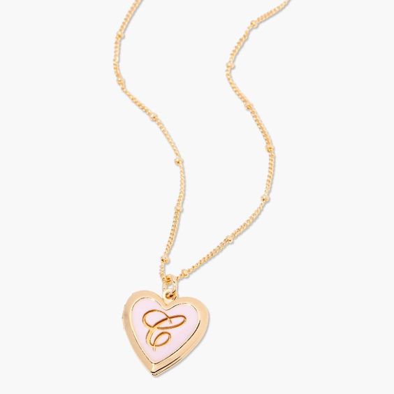 Shop our most wanted pink enamel heart locket. Pink Heart Pendant Necklace With Locket, Pink Heart-shaped Jewelry With Heart Detail, Personalized Pink Locket Necklace Gift, Personalized Pink Locket Necklace For Gift, Gold Jewelry With Heart Graphic For Valentine's Day, Valentine's Day Pink Gold Heart Necklace, Pink Heart Pendant Jewelry For Personalized Gift, Pink Gold Heart Charm Necklace For Gift, Pink Heart Locket Jewelry