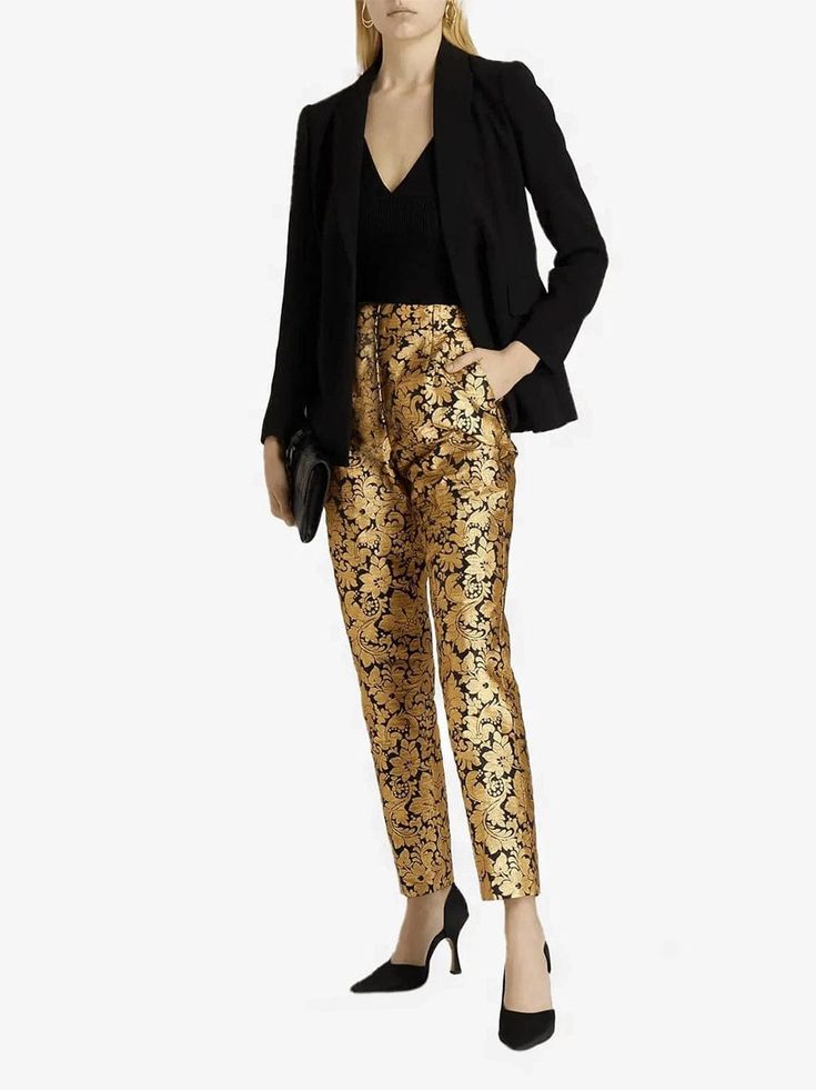 Cut for a tailored silhouette with pressed creases, these Dolce & Gabbana Metallic Jacquard Pants are designed to create bold, timeless look. The soft fabric is accented shimmering gold that adds an elegant finish. Zipper and button-closure pockets lend contemporary edge this chic design. Jacquard Pants, Pants For Woman, Leg Work, Metallic Fabric, Gold Shimmer, Tapered Pants, Dolce & Gabbana, Chic Design, Soft Fabric