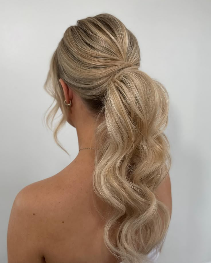 Center Part Ponytail Wedding, Sleek Pony For Wedding, Chic Bridal Ponytail, Winter Formal Ponytail Hairstyles, Messy Pony Wedding Hair, Bun For Prom Hair, Bridal Pony Hairstyles, Bridal Hairstyles Ponytail With Veil, Side Bun Prom Hair