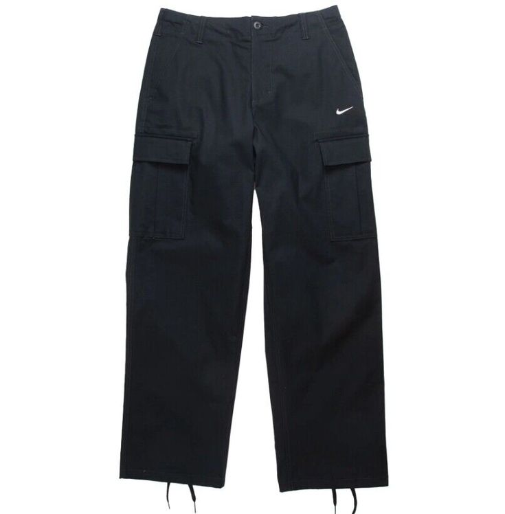 AUTHENTIC NIKE SB KEARNY PANTS FD0401-010 LOOSE FIT  97% Cotton, 3% Elastane POCKET BAGS 87% POLYESTER 13% COTTON Zip Fly Button Closure 2 CARGO  BUTTONED POCKETS FAKE CARE LABEL STASH POCKET INSIDE WAIST  drawstrings 2 Side Pockets 2 Back  BUTTONED Pockets LACED CUFF Nike Cargo Bottoms, Nike Sporty Bottoms With Cargo Pockets, Nike Sporty Cargo Pants With Pockets, Nike Sporty Cargo Pants, Nike Casual Pants With Cargo Pockets, Casual Nike Cargo Pants With Side Pockets, Nike Cotton Long Pants, Nike Sporty Pants With Pockets, Sporty Spring Pants With Patch Pockets