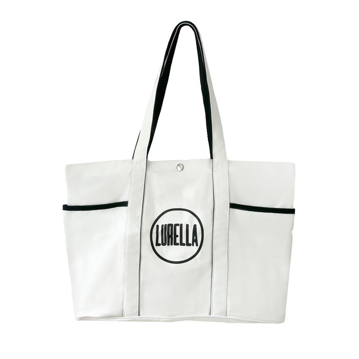 a white tote bag with the word luebla on it and black trimmings