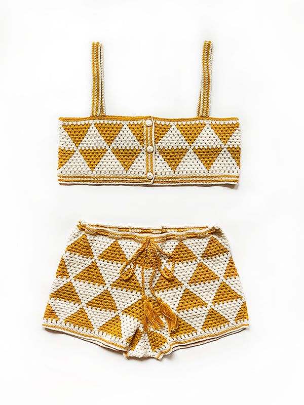 two piece swimsuit with gold and white geometric pattern on the bottom, front and back