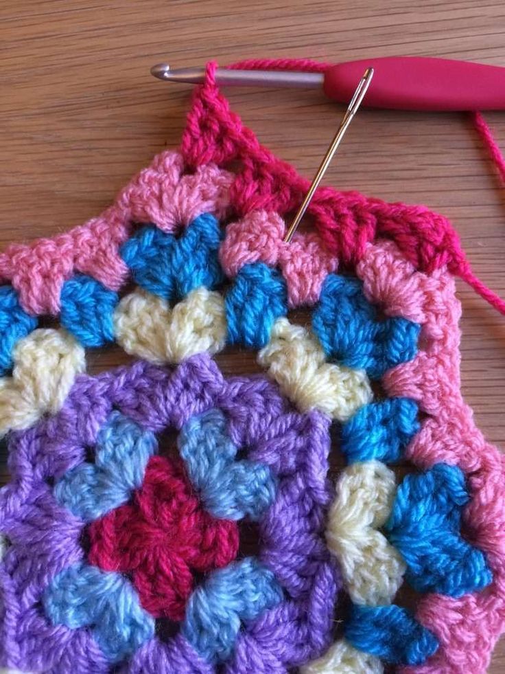 the crochet is being worked on with yarn