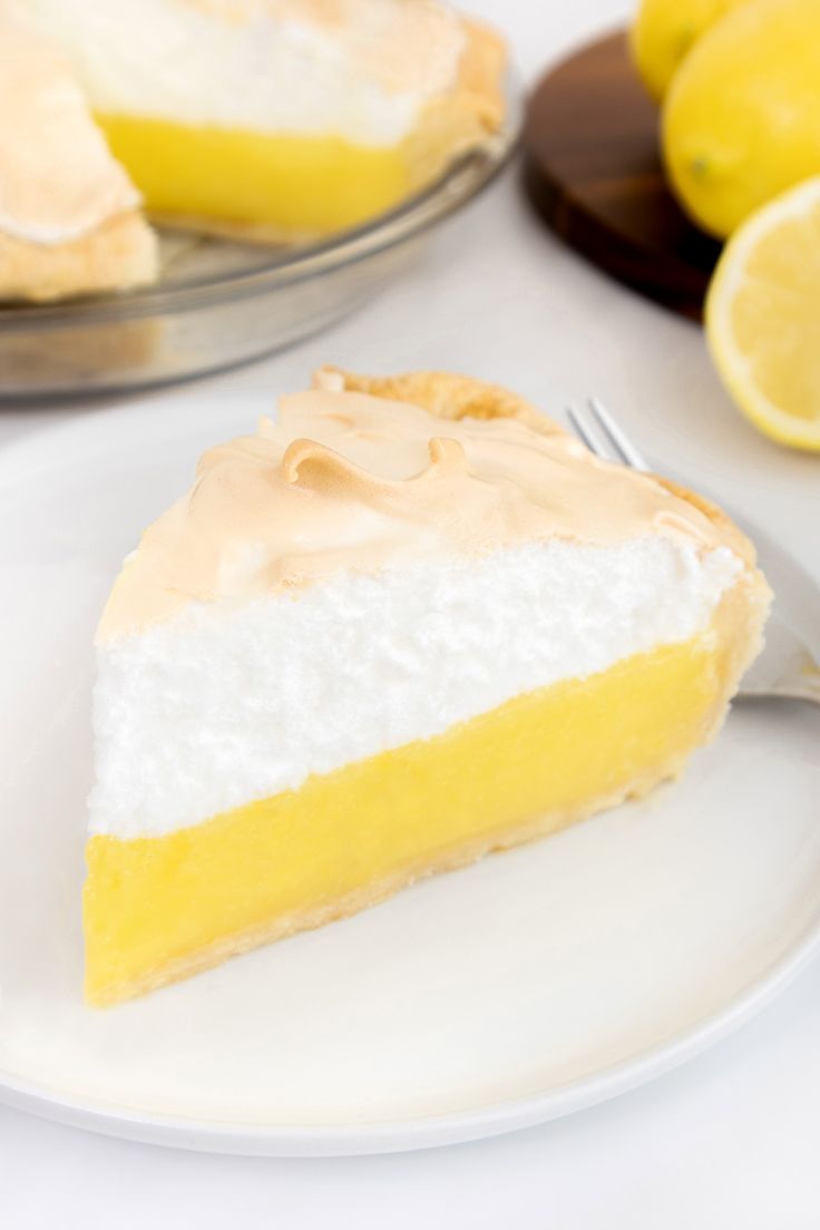 a slice of lemon meringue pie on a plate