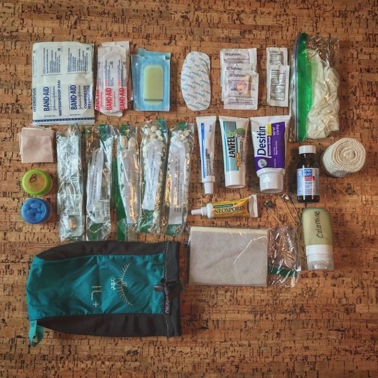 the contents of an emergency kit laid out on a table