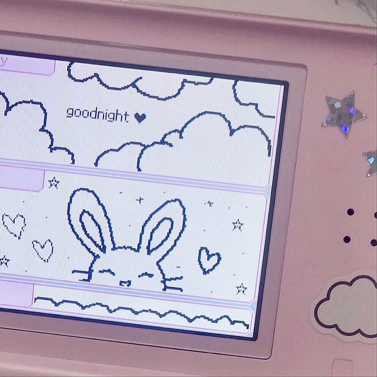 a pink electronic device with an image of a bunny on it's display screen