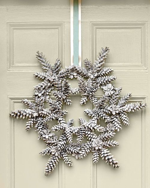 a snowflake hanging from the side of a door