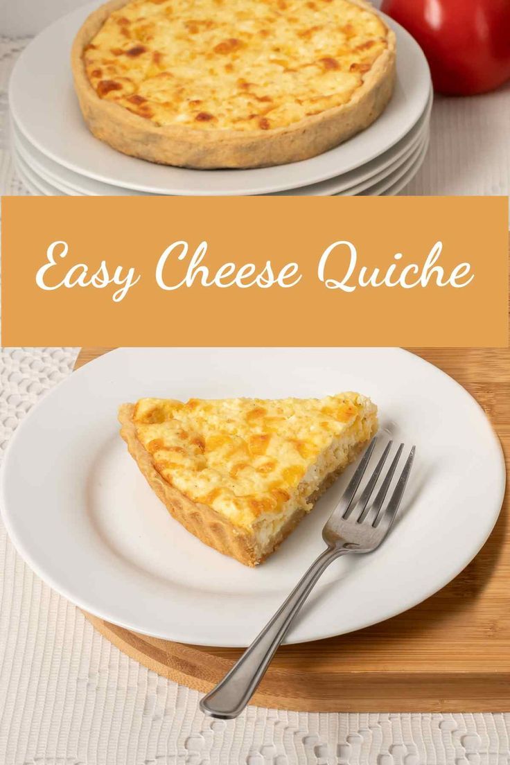 an easy cheese quiche on a white plate with a fork and tomatoes in the background